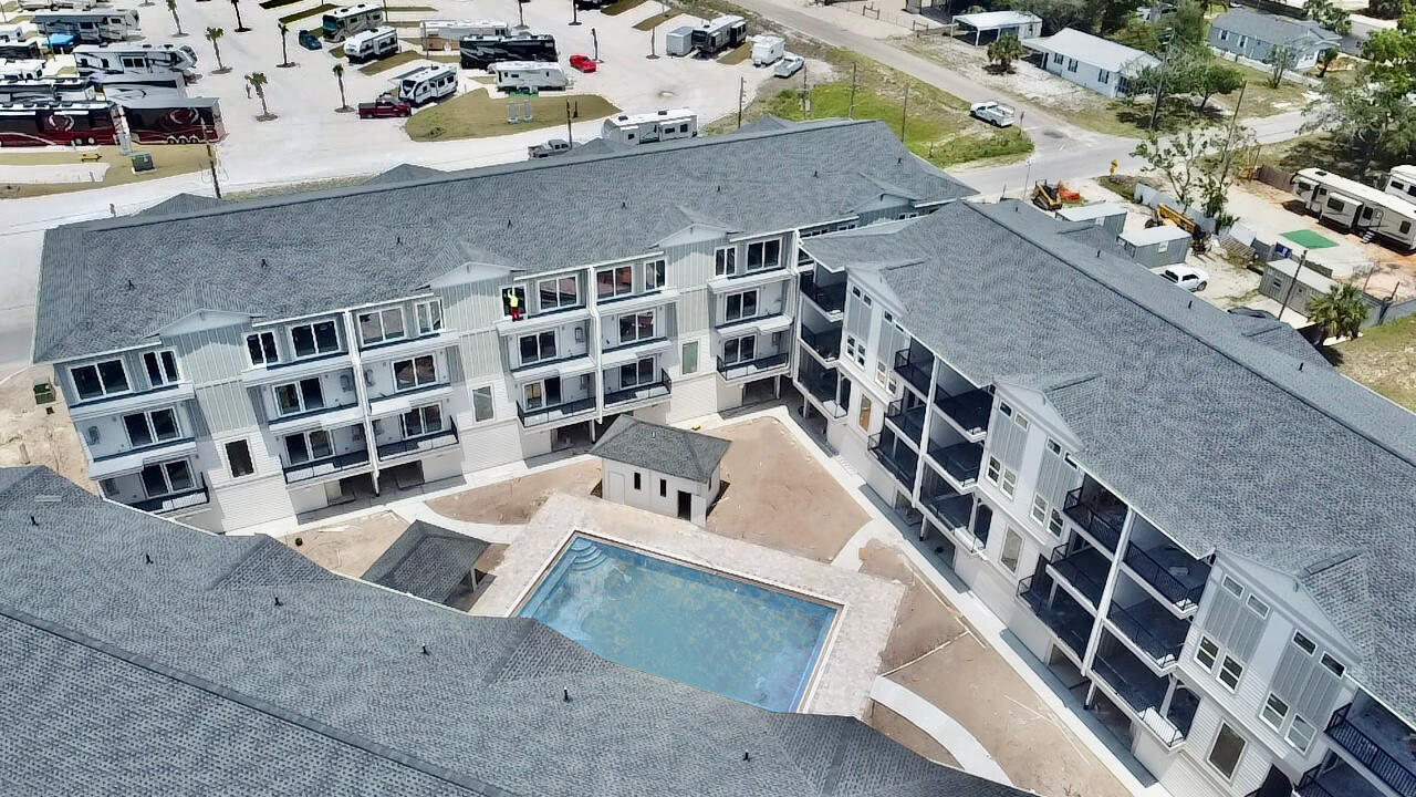 144 Redfish Street, Unit 29 Port St. Joe, FL 32456 - Photo 4 of 15 an aerial view of residential houses with outdoor space