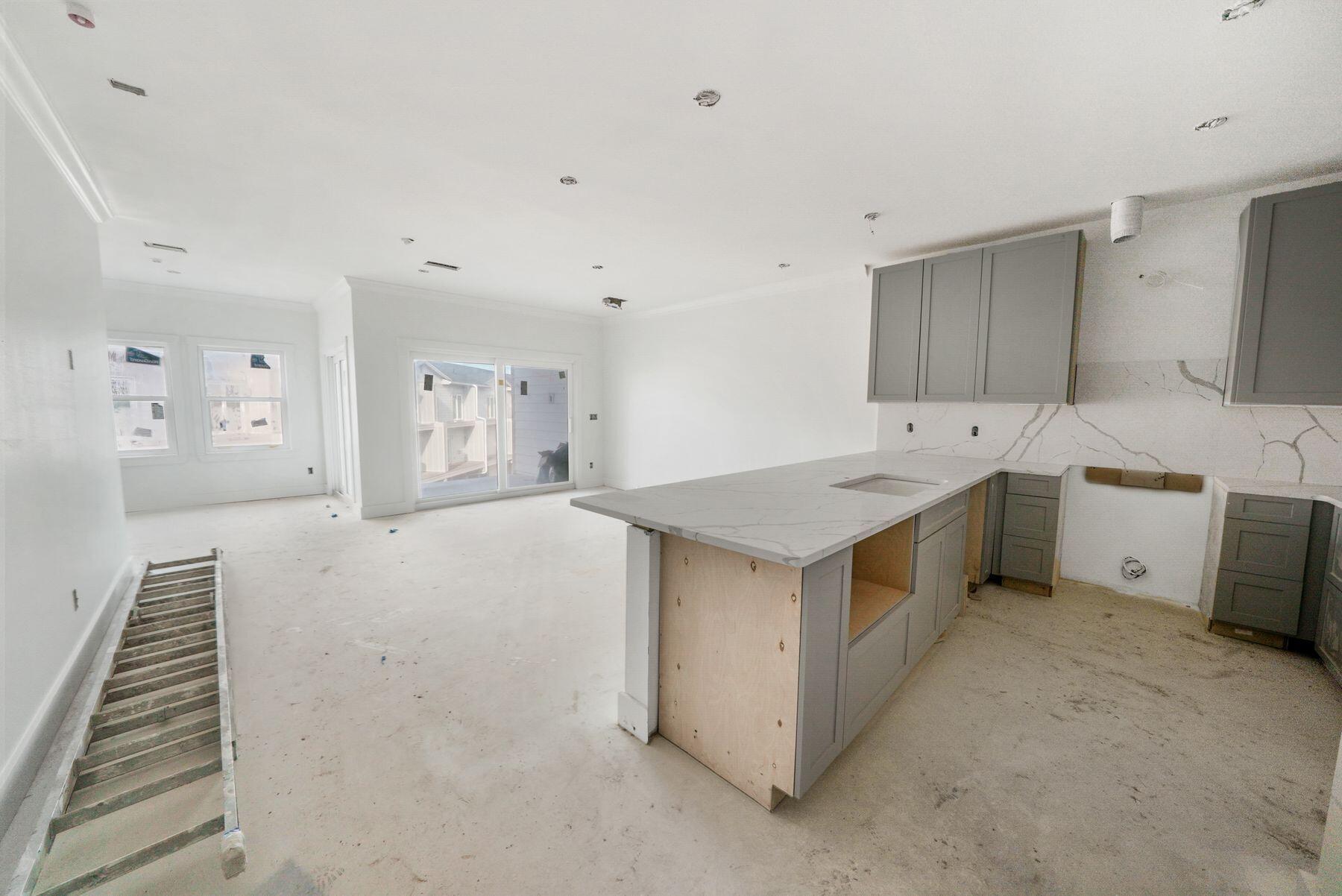 144 Redfish Street, Unit 29 Port St. Joe, FL 32456 - Photo 7 of 15 a view of a kitchen with electric appliances