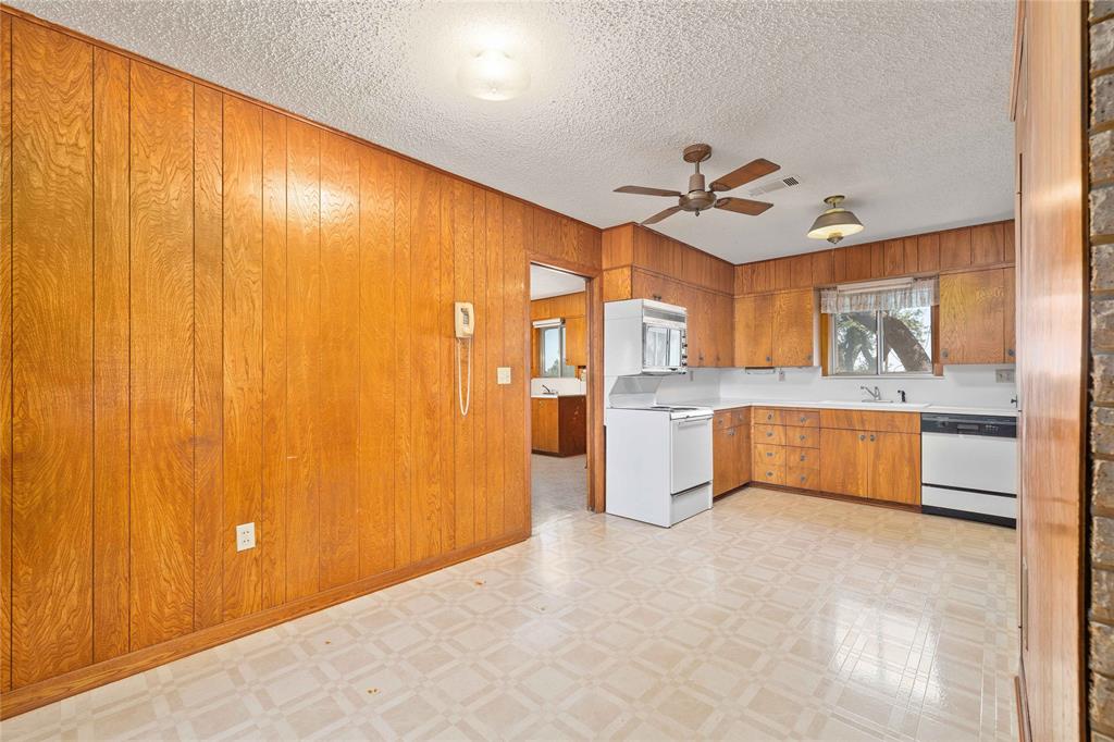 53 County Road 312 Goldthwaite, TX 76844 - Photo 16 of 35 a large white kitchen with a large window