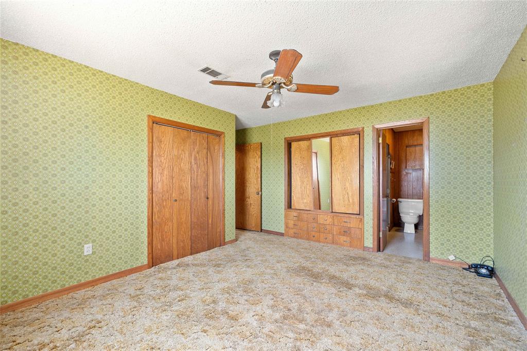 53 County Road 312 Goldthwaite, TX 76844 - Photo 24 of 35 a view of a big room with wooden floor and windows in a room