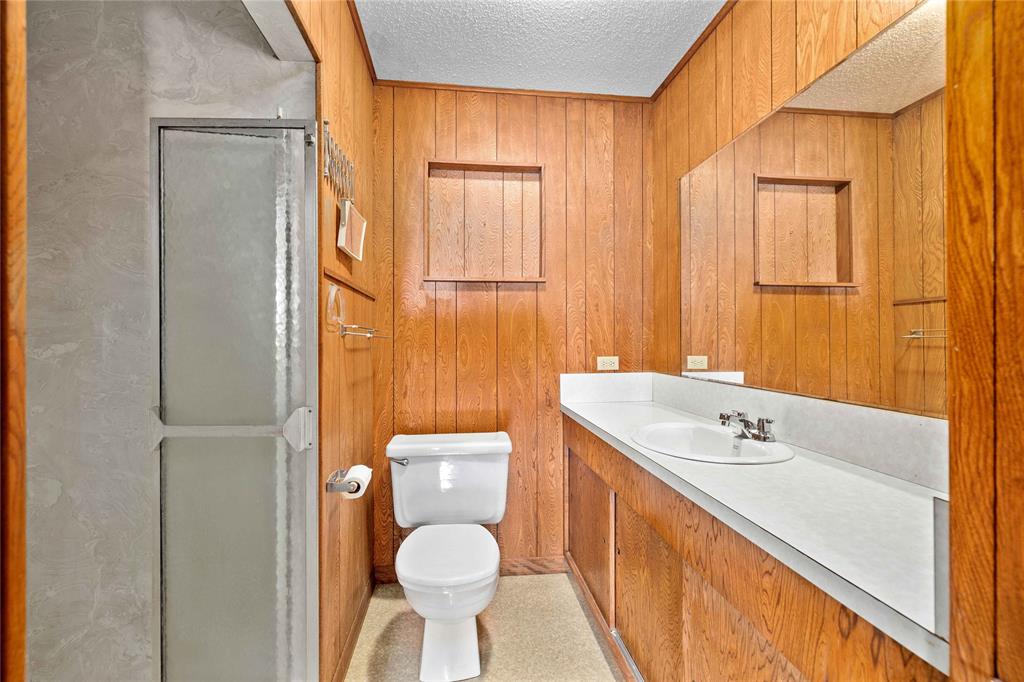 53 County Road 312 Goldthwaite, TX 76844 - Photo 25 of 35 a bathroom with a sink a toilet and shower