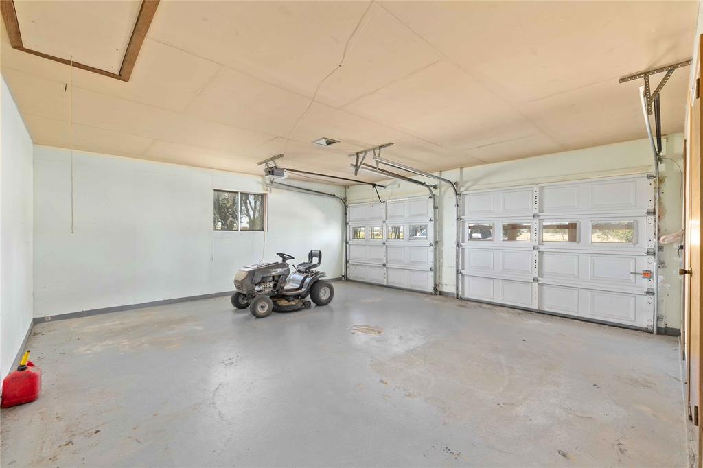 53 County Road 312 Goldthwaite, TX 76844 - Photo 29 of 35 a view of a garage with furniture and storage