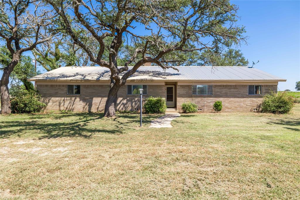 53 County Road 312 Goldthwaite, TX 76844 - Photo 5 of 35 a view of house with outdoor space and swimming pool