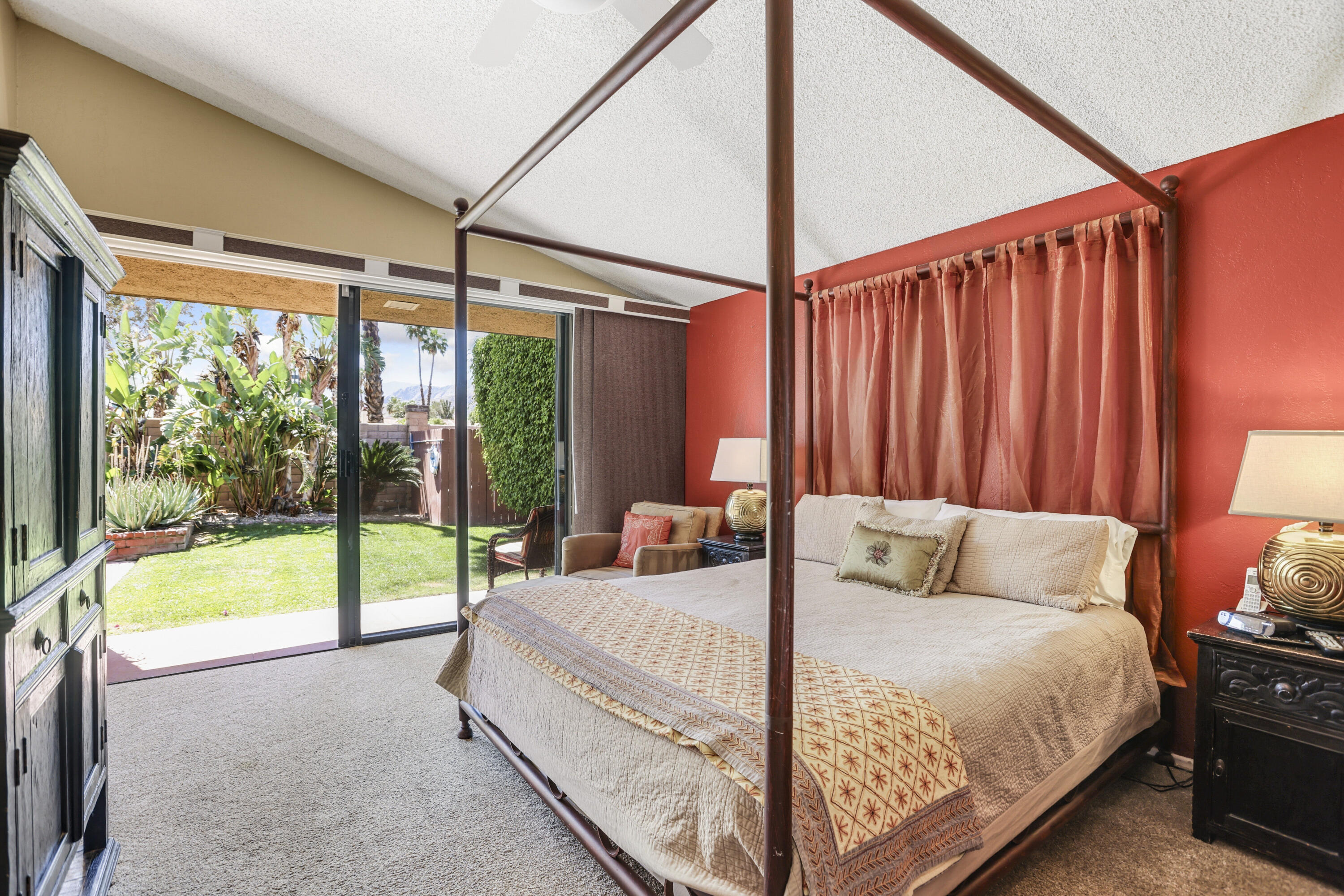 377 West Dominguez Road Palm Springs, CA 92262 - Photo 16 of 29 a bed sitting in a bedroom next to a window