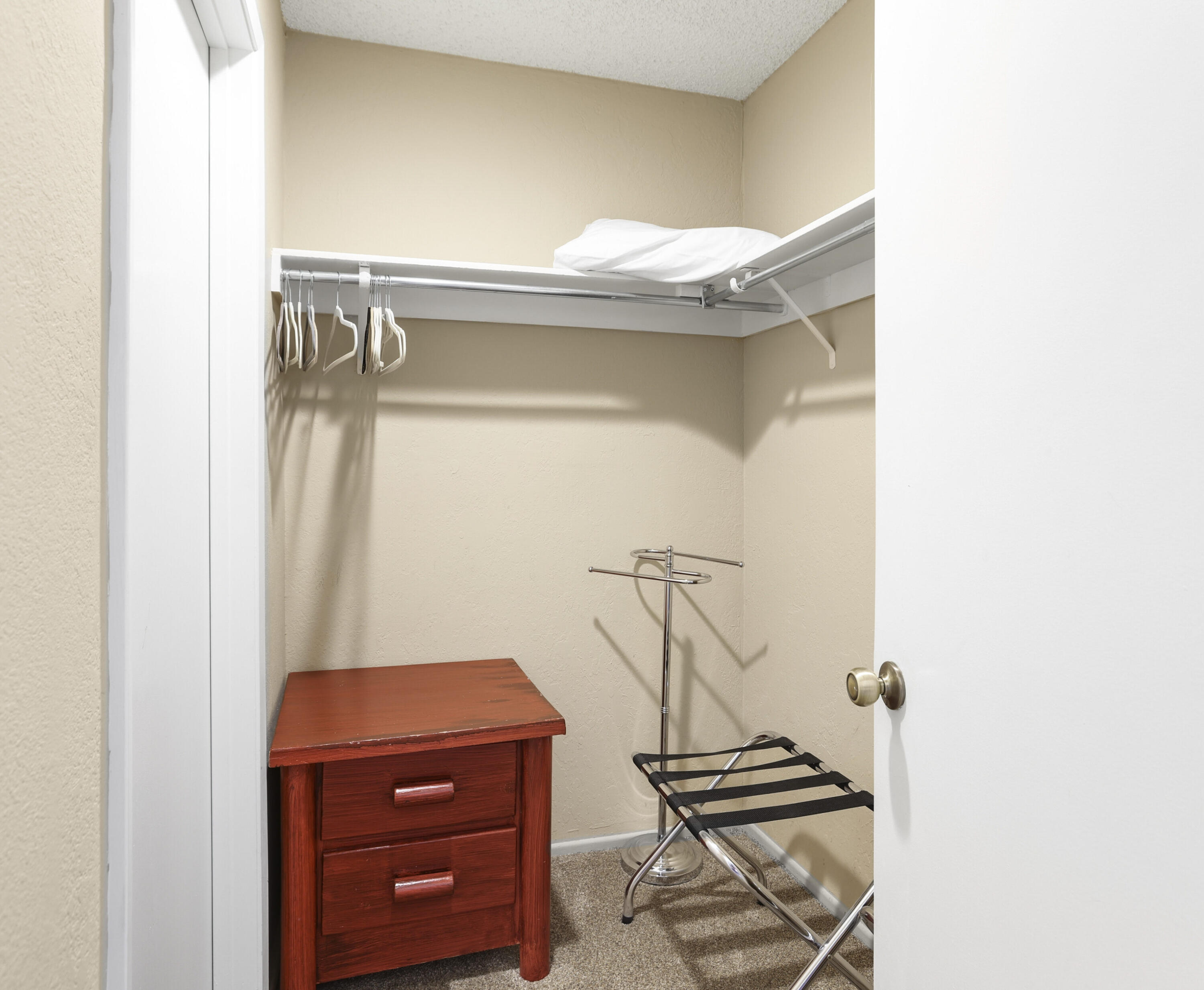377 West Dominguez Road Palm Springs, CA 92262 - Photo 19 of 29 a room with a closet and wooden floor