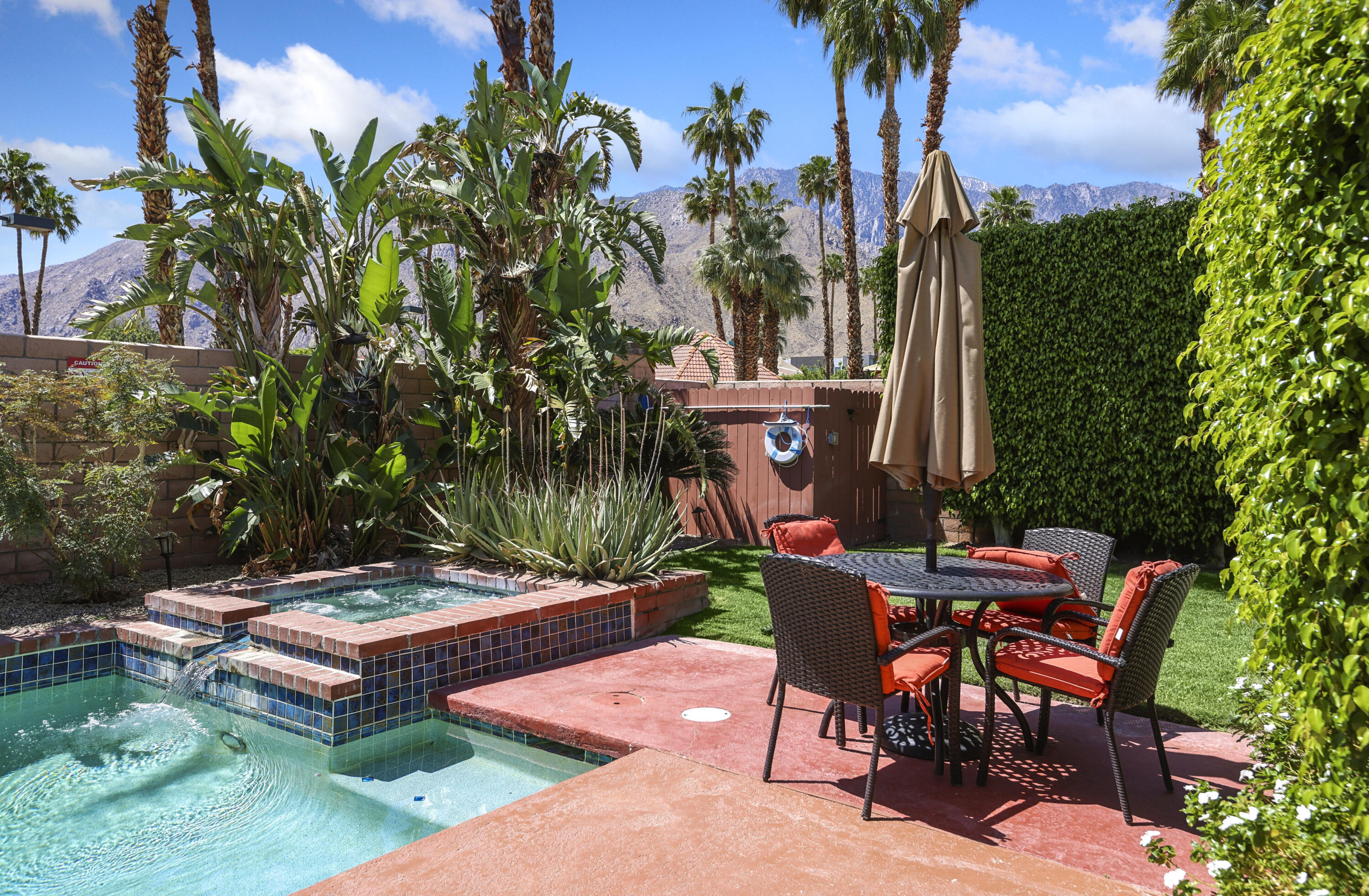 377 West Dominguez Road Palm Springs, CA 92262 - Photo 23 of 29 a view of a backyard with sitting area
