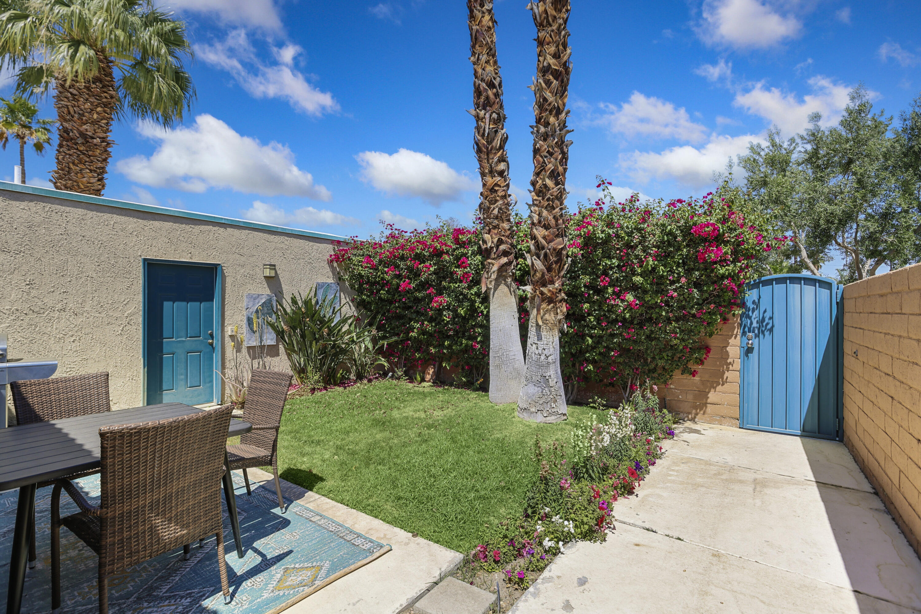 377 West Dominguez Road Palm Springs, CA 92262 - Photo 5 of 29 a view of a house with backyard and sitting area
