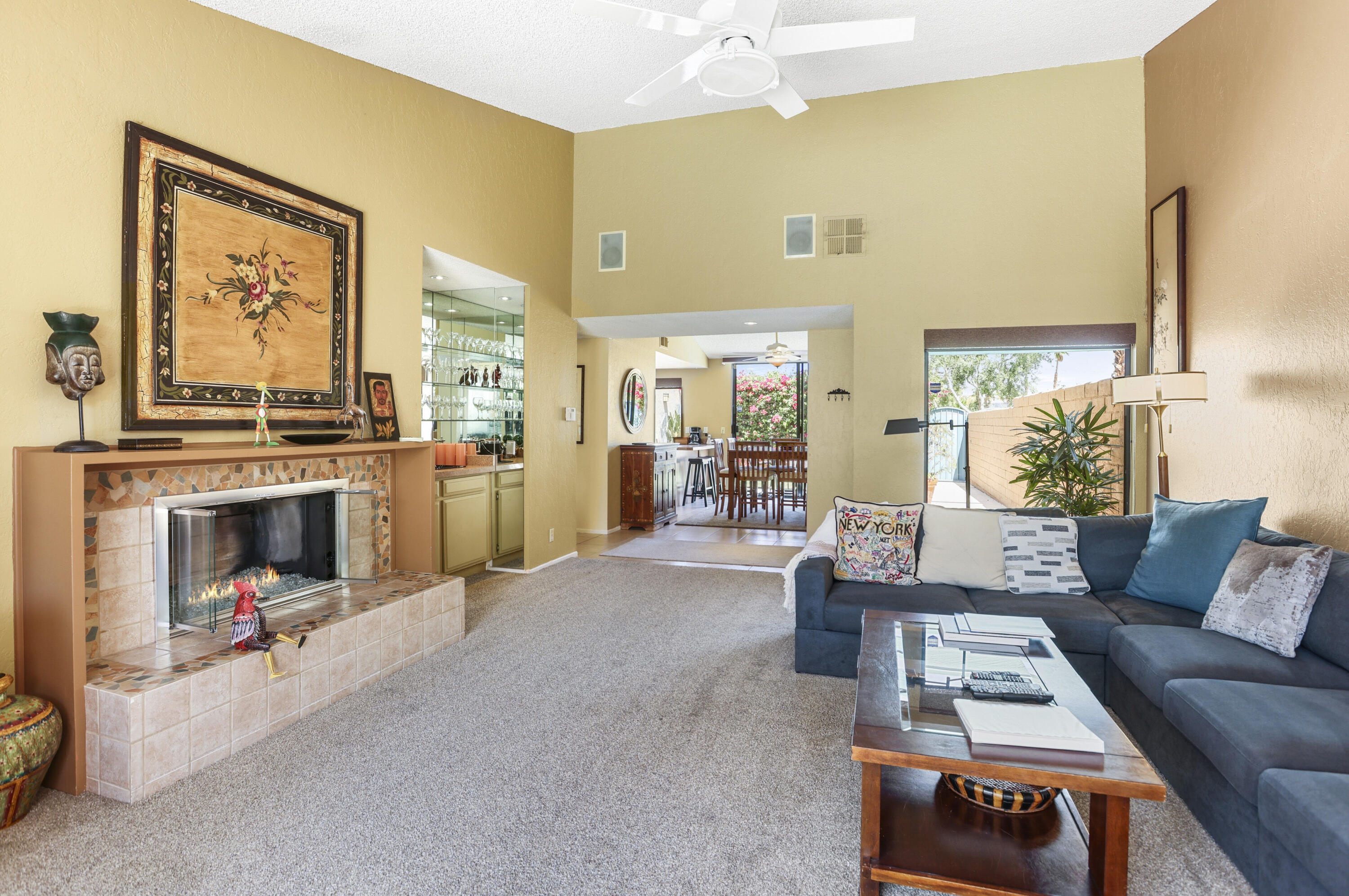 377 West Dominguez Road Palm Springs, CA 92262 - Photo 7 of 29 a living room with furniture and a fireplace