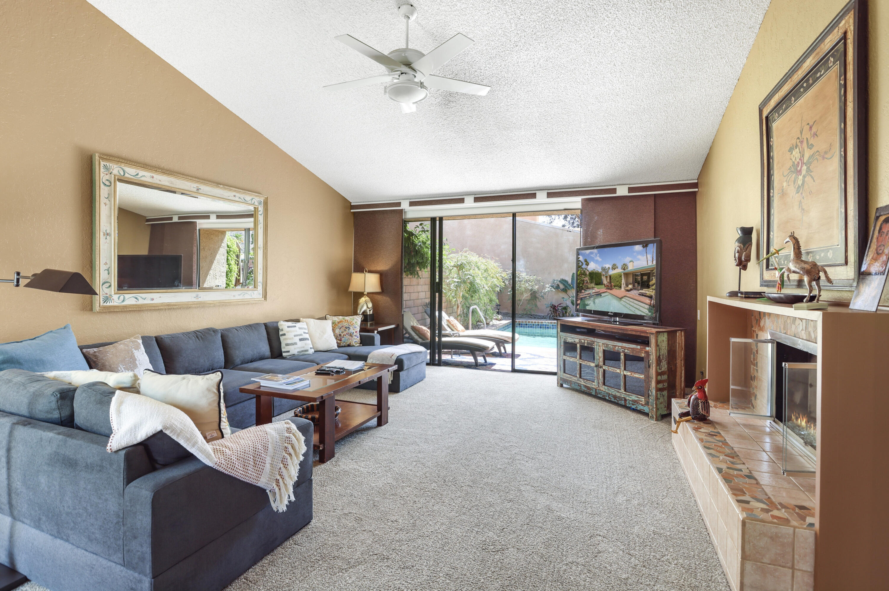 377 West Dominguez Road Palm Springs, CA 92262 - Photo 10 of 29 a living room with furniture and a large window