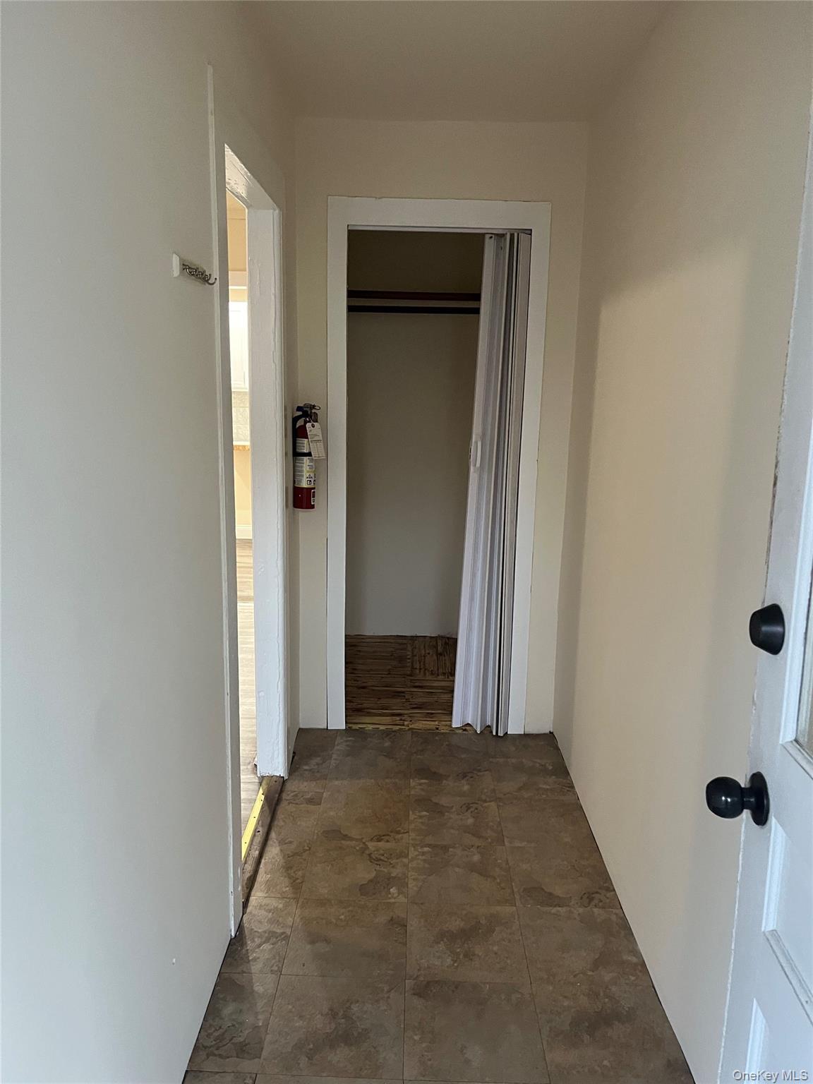 26 Franklindale Avenue, Unit 2 Wappingers Falls, NY 12590 - Photo 3 of 7 Hallway featuring stone finish flooring