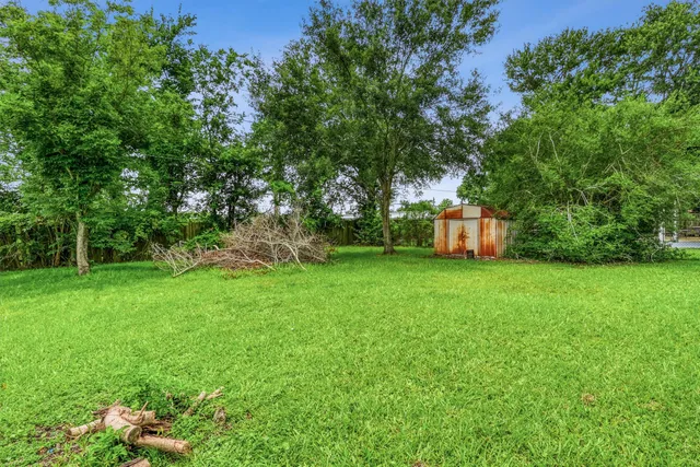a view of a backyard with a garden