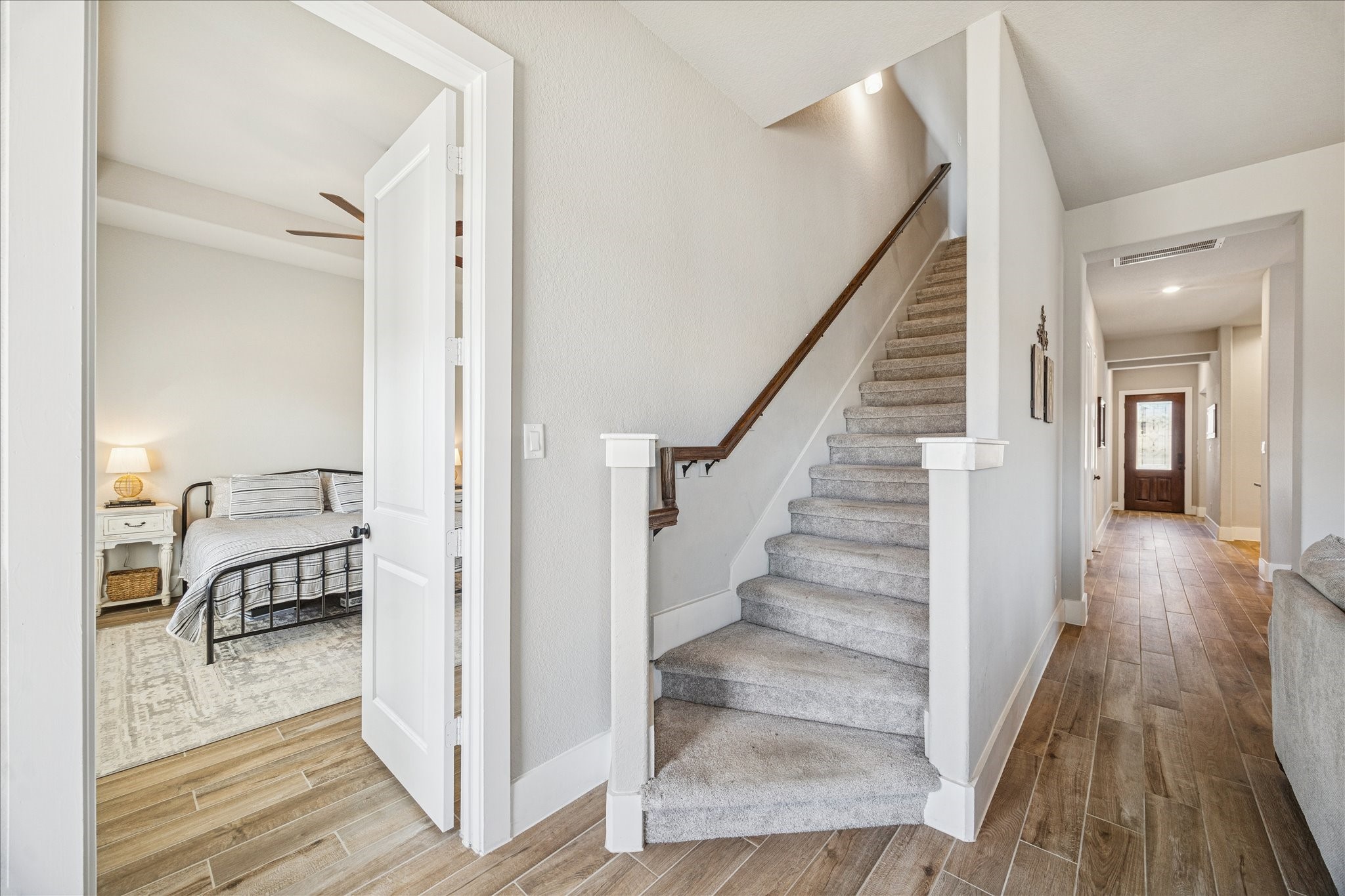 24030 Willow Rose Drive Spring, TX 77389 - Photo 20 of 39 Stairs outside of the primary bedroom lead to an upstairs living space, four additional bedrooms, & two more full bathrooms.