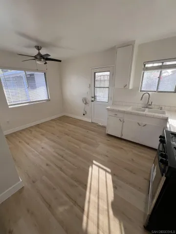 a room with a bed and a window