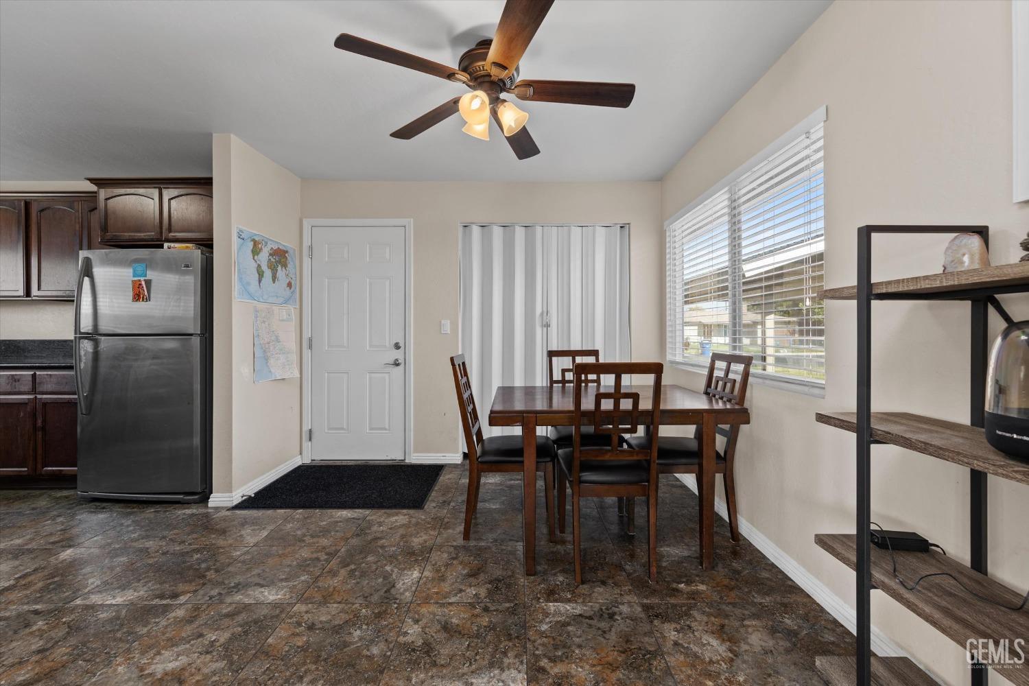 Undisclosed Address Bakersfield, CA 93309 - Photo 11 of 31 a view of a dining room with furniture window and outside view