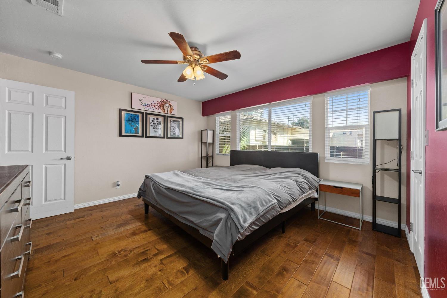 Undisclosed Address Bakersfield, CA 93309 - Photo 18 of 31 a bedroom with a large bed and a window