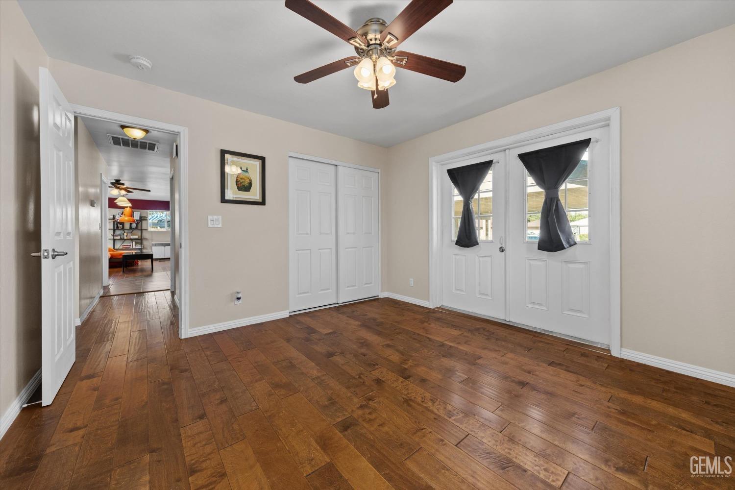 Undisclosed Address Bakersfield, CA 93309 - Photo 23 of 31 a view of empty room with wooden floor