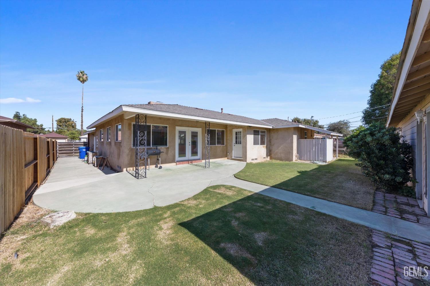 Undisclosed Address Bakersfield, CA 93309 - Photo 30 of 31 a view of a house with a yard