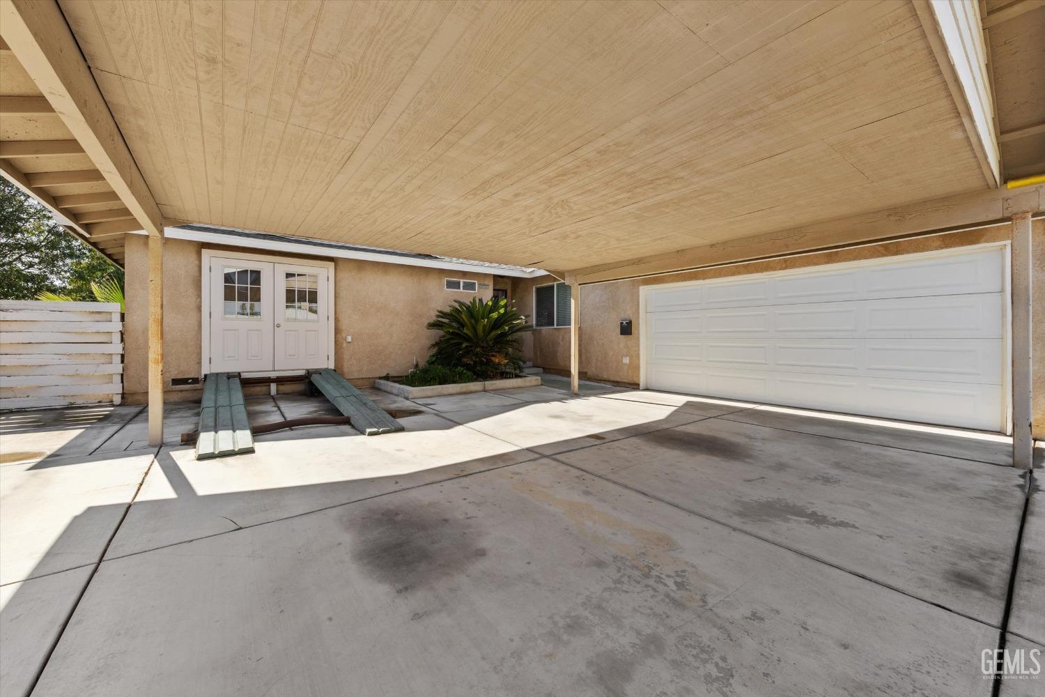 Undisclosed Address Bakersfield, CA 93309 - Photo 4 of 31 a view of a house with a street