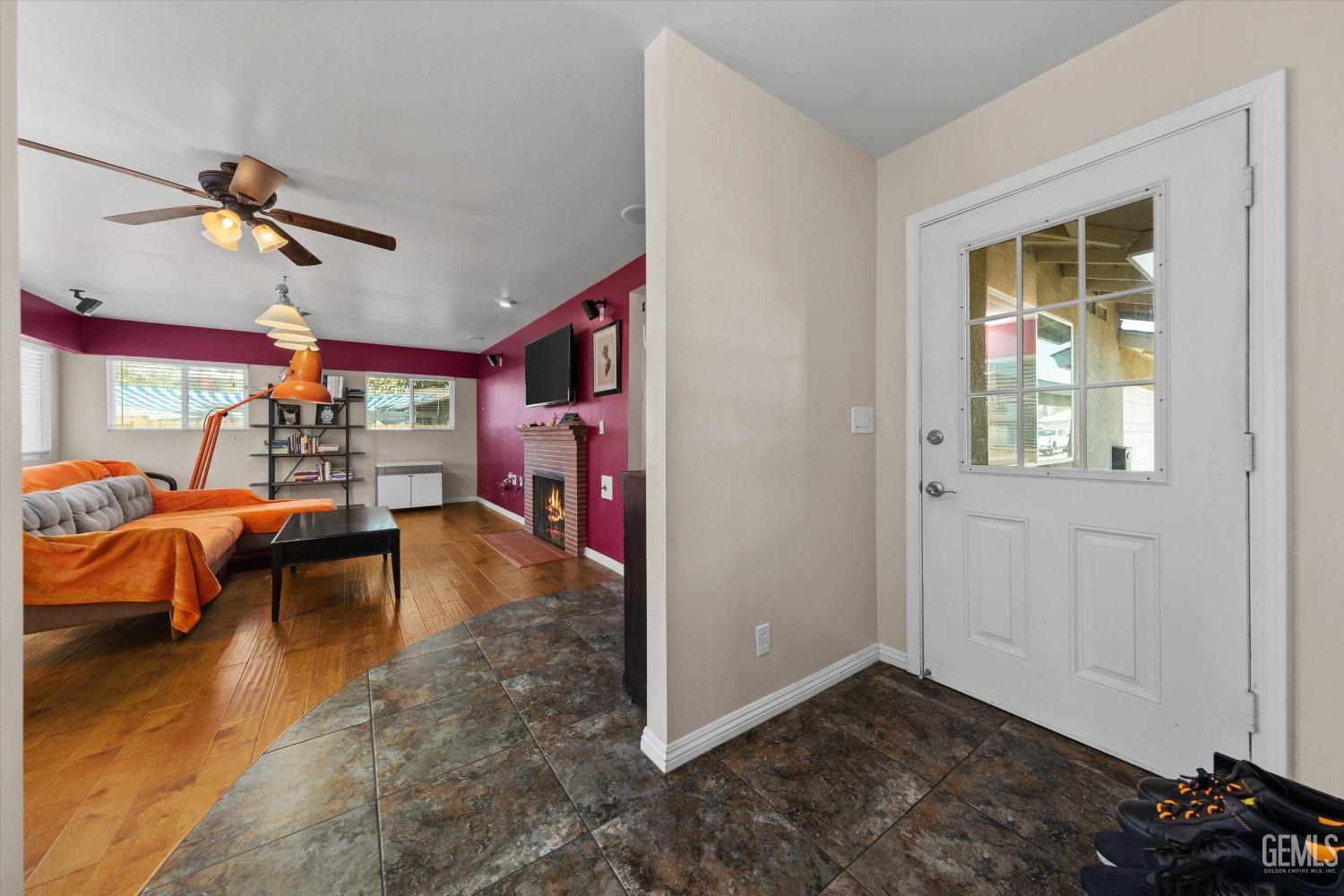 Undisclosed Address Bakersfield, CA 93309 - Photo 7 of 31 a view of a livingroom with furniture and a ceiling fan