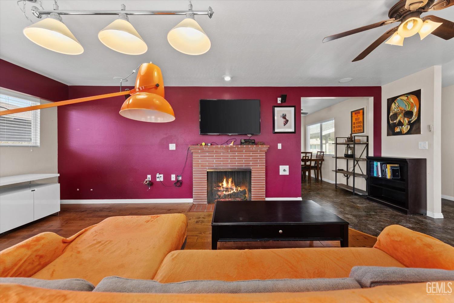 Undisclosed Address Bakersfield, CA 93309 - Photo 9 of 31 a living room with furniture and a fireplace