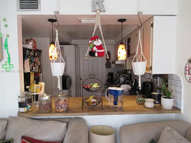 a view of a workspace with furniture