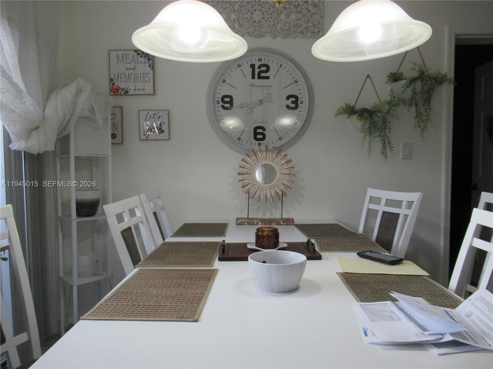 6601 Southwest 137th Court, Unit 2B Miami, FL 33183 - Photo 15 of 41 a view of living room with furniture and a mirror