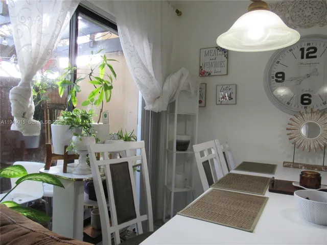 a view of a refrigerator in kitchen