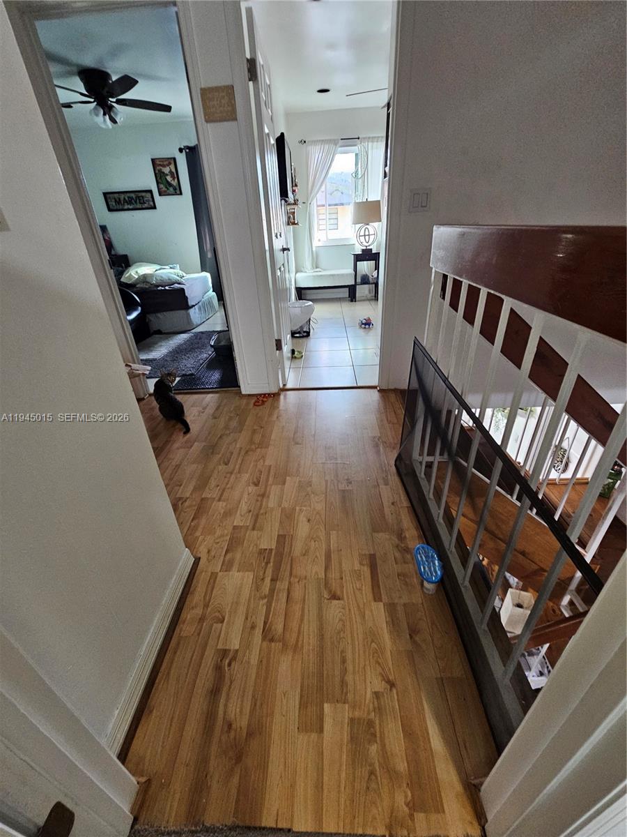 6601 Southwest 137th Court, Unit 2B Miami, FL 33183 - Photo 21 of 41 a view of an empty room with wooden floor