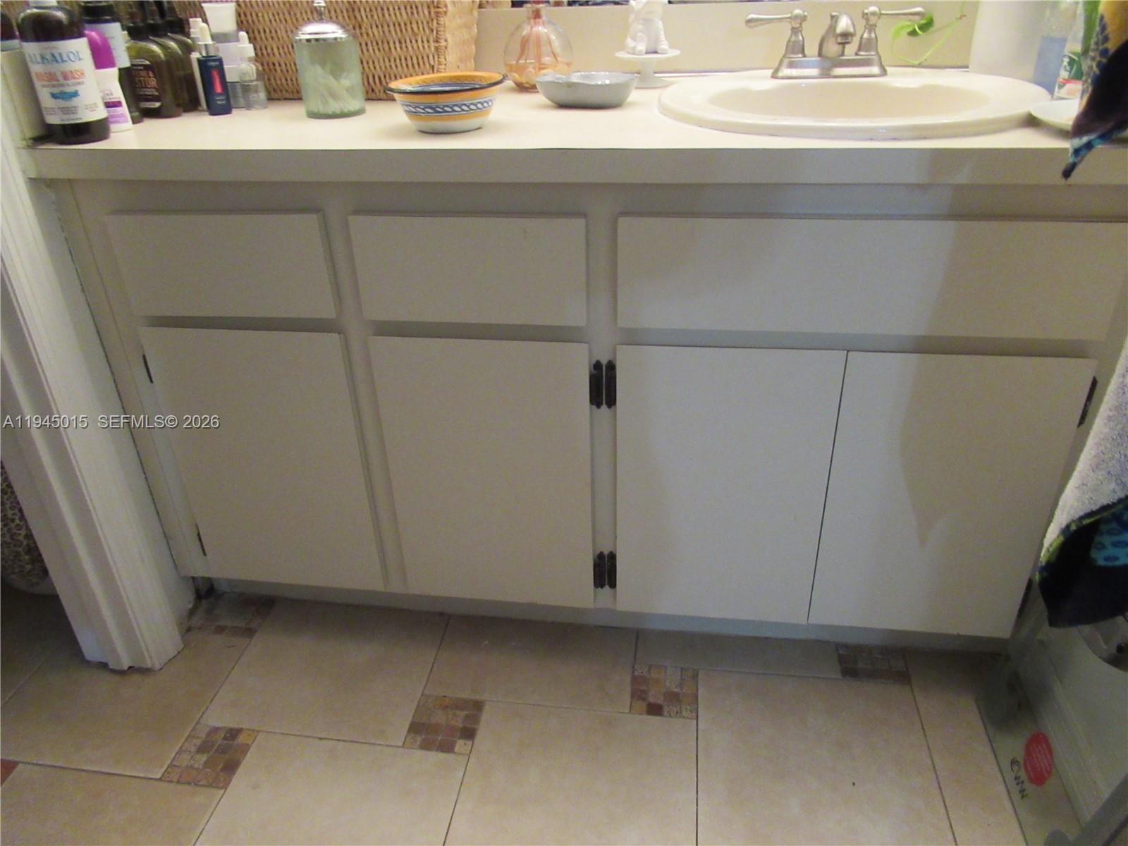 6601 Southwest 137th Court, Unit 2B Miami, FL 33183 - Photo 26 of 41 a close view of washer and dryer