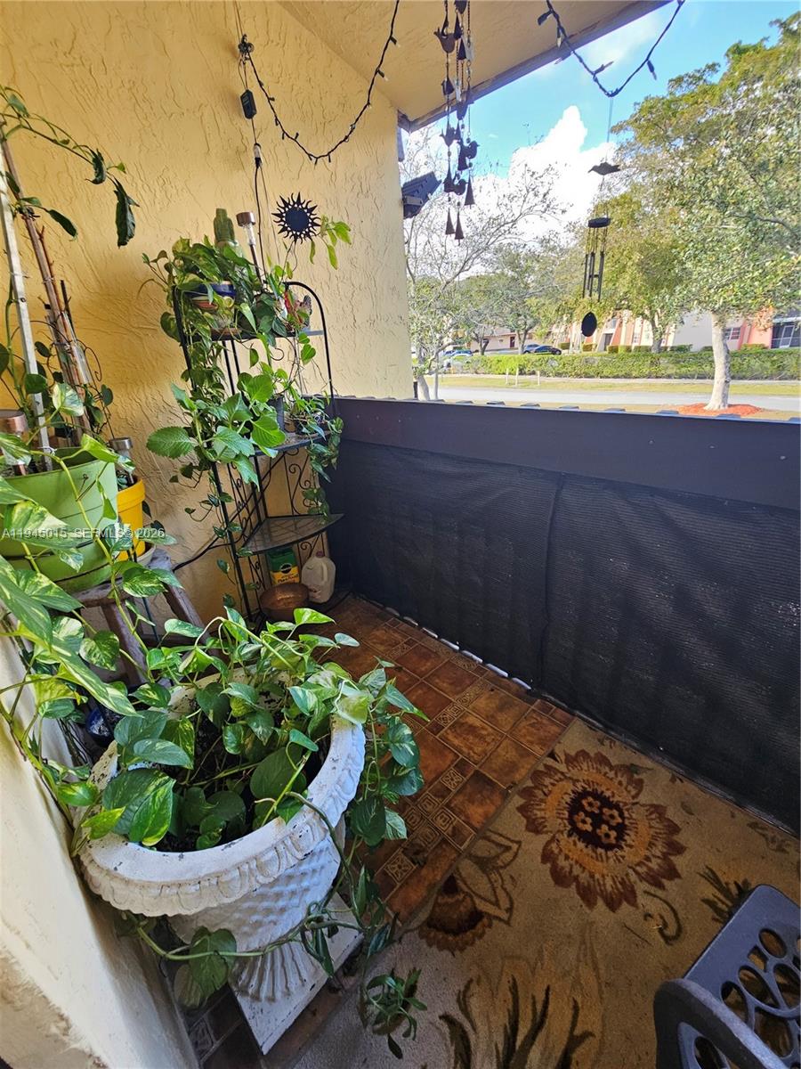 6601 Southwest 137th Court, Unit 2B Miami, FL 33183 - Photo 28 of 41 a view of a back yard of the house