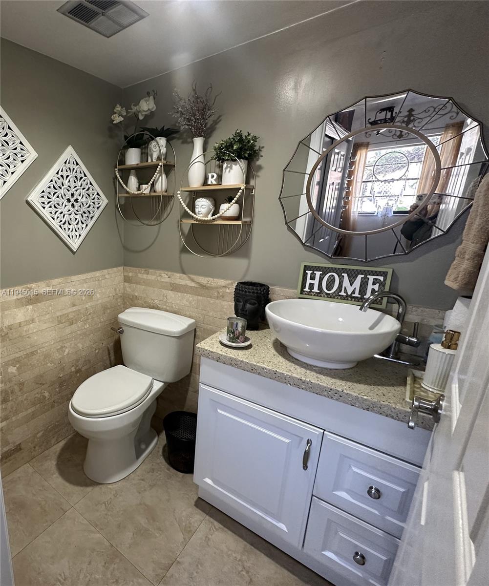 6601 Southwest 137th Court, Unit 2B Miami, FL 33183 - Photo 29 of 59 Half Bathroom on first floor