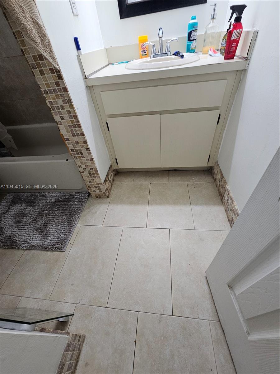 6601 Southwest 137th Court, Unit 2B Miami, FL 33183 - Photo 33 of 41 a utility room with washer and dryer