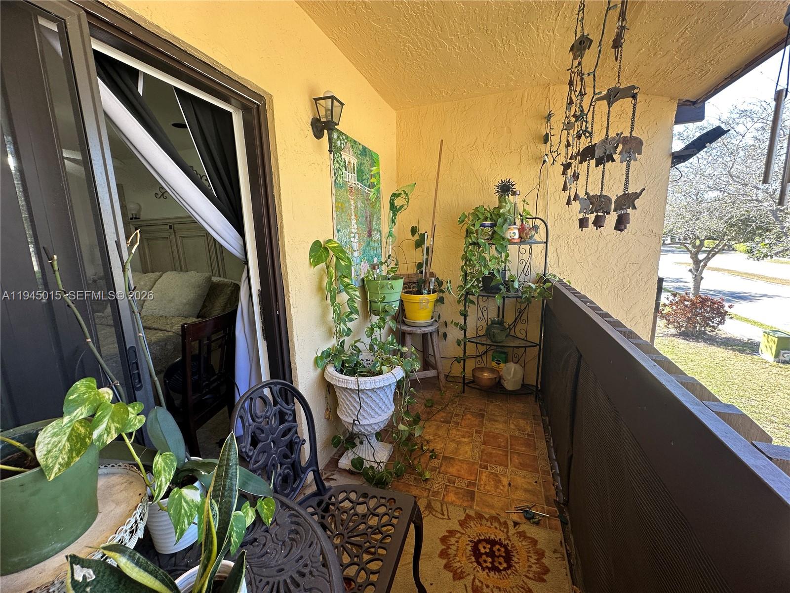 6601 Southwest 137th Court, Unit 2B Miami, FL 33183 - Photo 40 of 59 Primary Bedroom Balcony