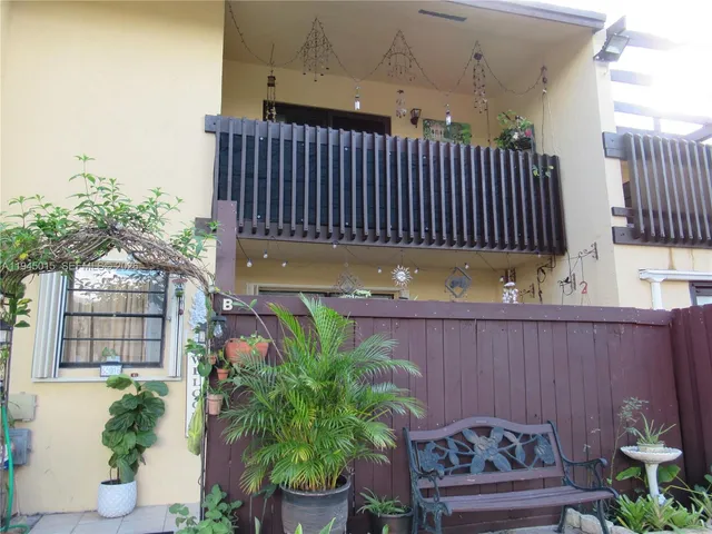 a view of a backyard with a tub