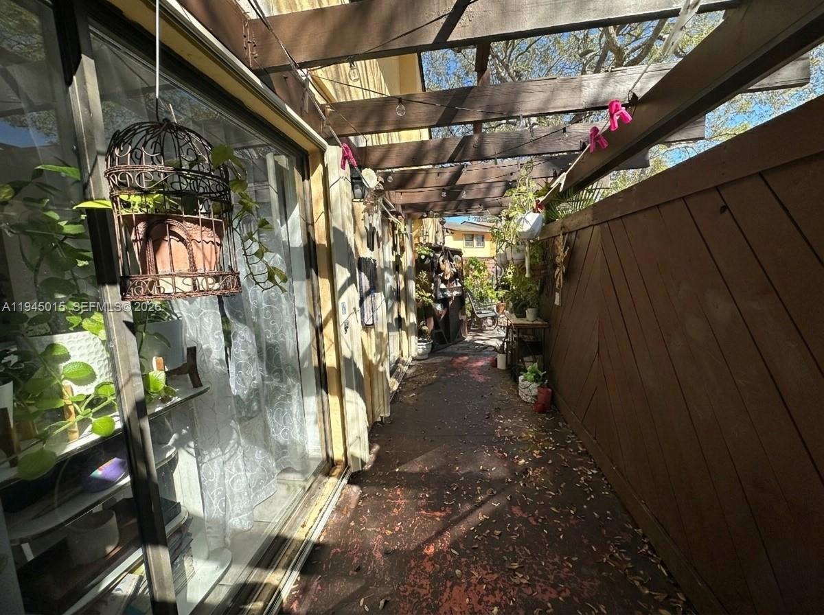 6601 Southwest 137th Court, Unit 2B Miami, FL 33183 - Photo 50 of 59 Back Patio