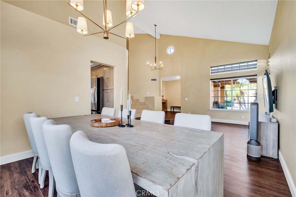 1780 North Azure Street Anaheim, CA 92807 - Photo 17 of 68 a view of a dining room with furniture and wooden floor