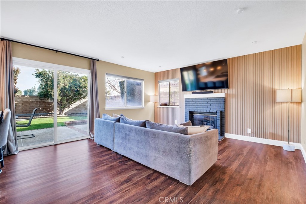1780 North Azure Street Anaheim, CA 92807 - Photo 29 of 68 a living room with fireplace furniture and a flat screen tv