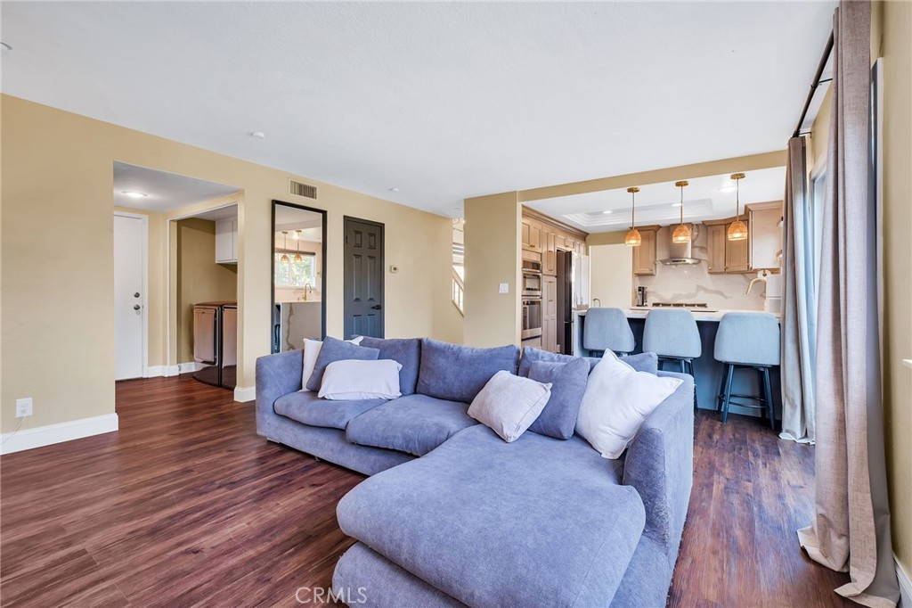 1780 North Azure Street Anaheim, CA 92807 - Photo 30 of 68 a living room with furniture and a wooden floor