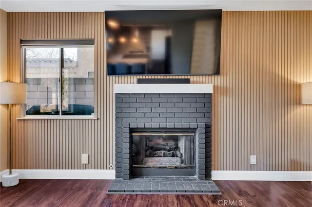 a bathroom with a tub a sink and mirror