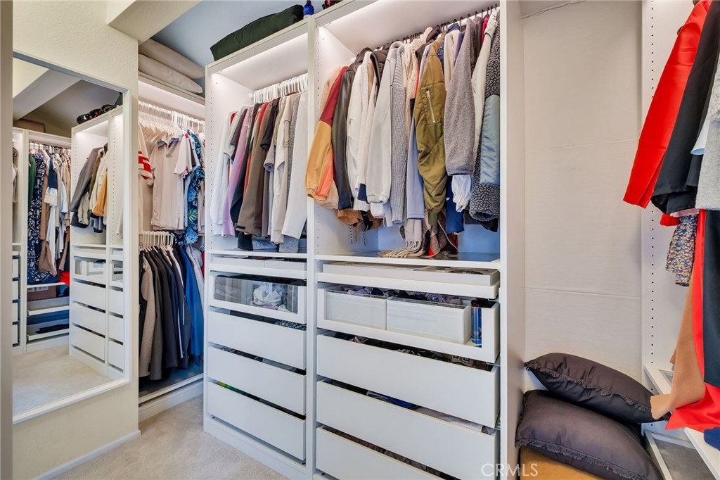 1780 North Azure Street Anaheim, CA 92807 - Photo 41 of 68 a view of walk in closet with clothes and shoes