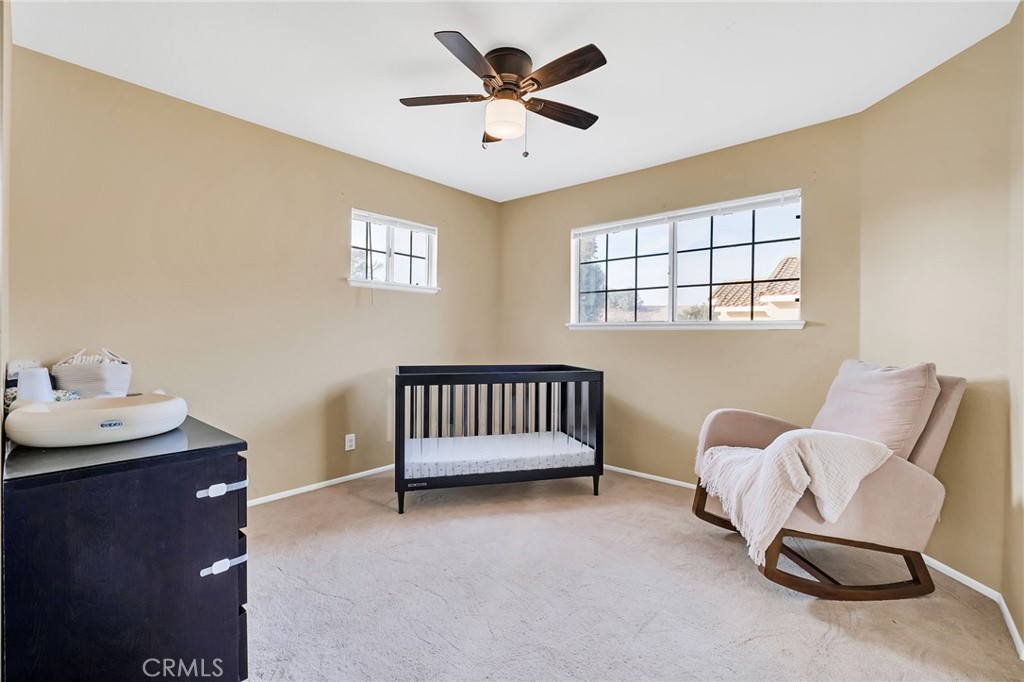 1780 North Azure Street Anaheim, CA 92807 - Photo 47 of 68 a bedroom with furniture and a window