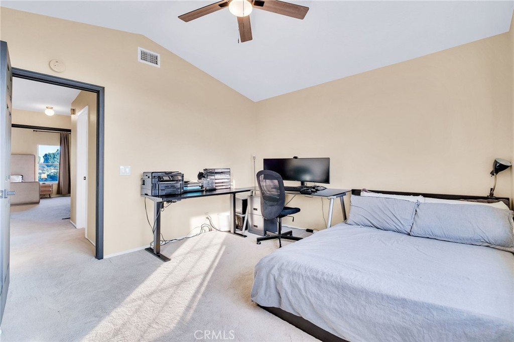 1780 North Azure Street Anaheim, CA 92807 - Photo 51 of 68 a bedroom with a bed and a chair