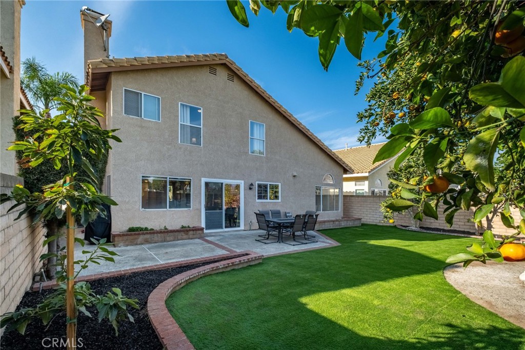 1780 North Azure Street Anaheim, CA 92807 - Photo 55 of 68 a front view of a house with a yard