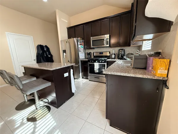 $2,000 | 12115 Rockridge Falls Drive, Tomball, TX 77375