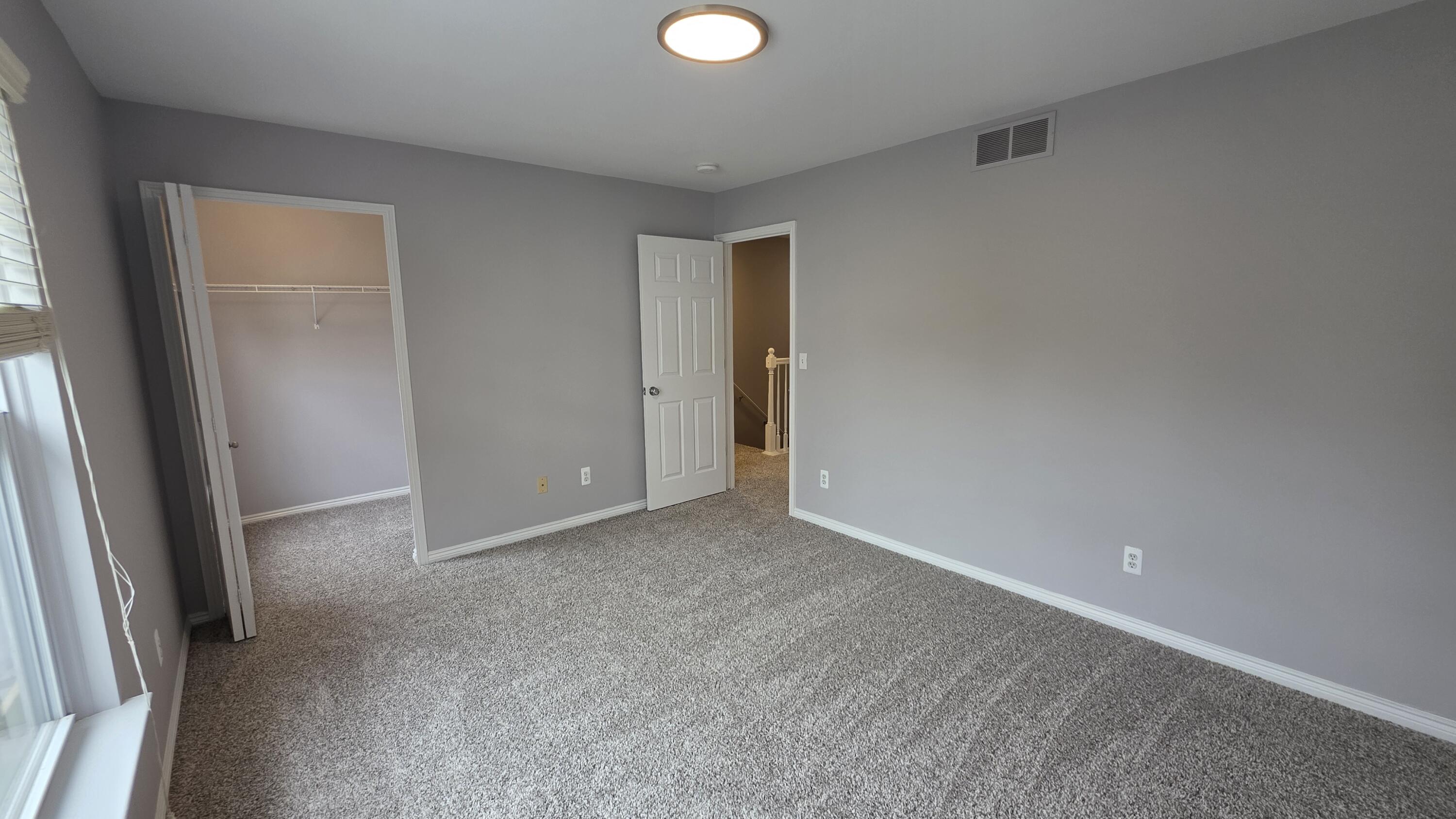 1563 Cass Lake Road Keego Harbor, MI 48320 - Photo 22 of 23 second bedroom with alk in closet