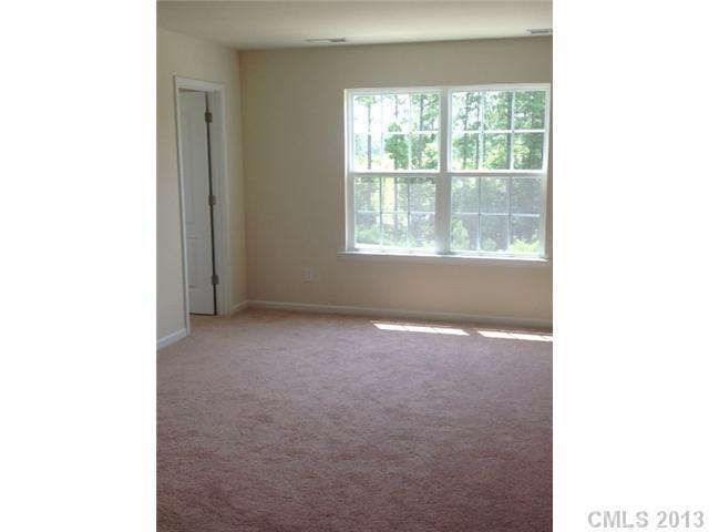 78062 Rillstone Drive, Unit LOT193 Lancaster, SC 29720 - Photo 5 of 15 a view of an empty room with a window