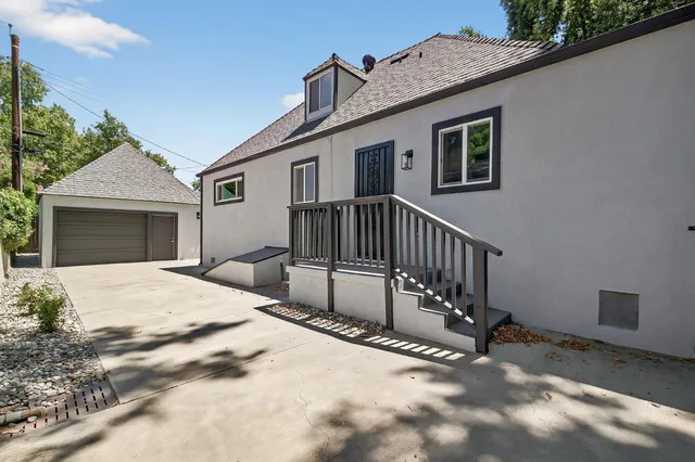 a view of a house with a roof deck