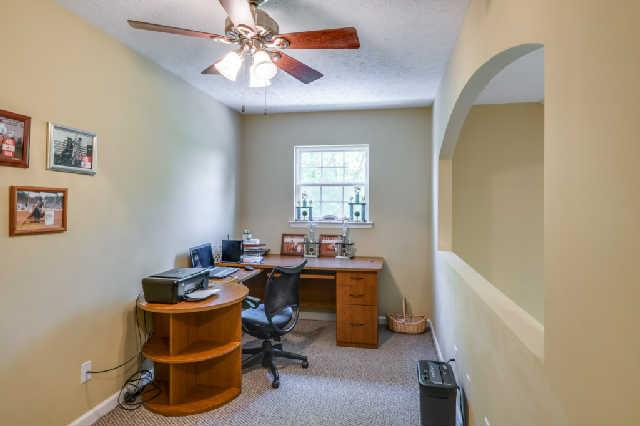 510 Dorris Road Portland, TN 37148 - Photo 10 of 20 a view of a workspace with furniture and a window