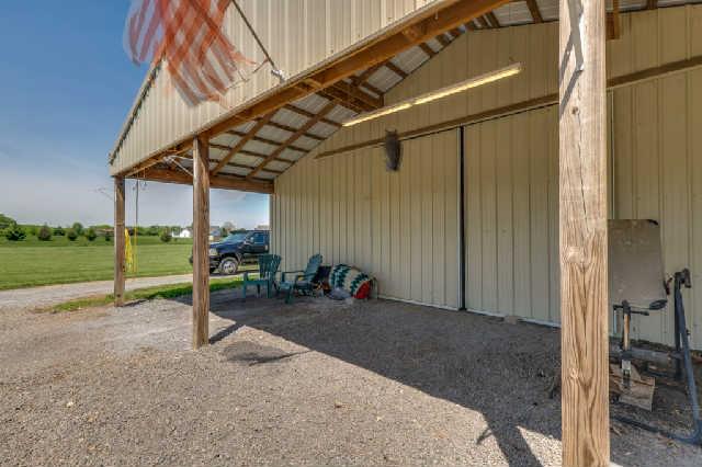510 Dorris Road Portland, TN 37148 - Photo 18 of 20 a view of a house with backyard and a tree