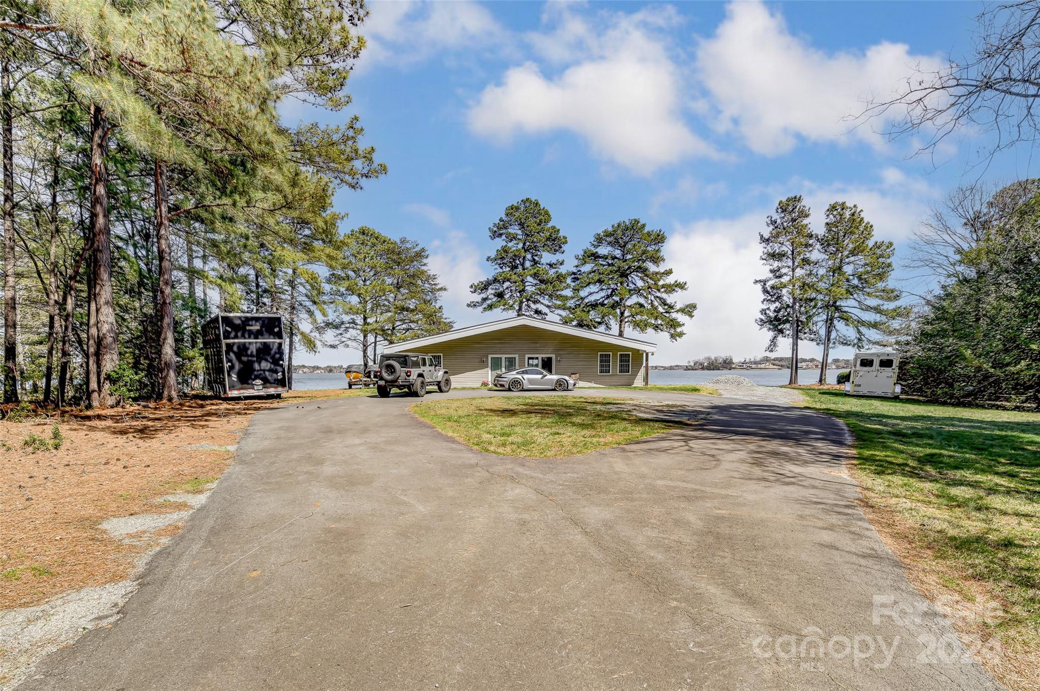 8303 Luckey Point Road Denver, NC 28037 - Photo 12 of 40 a view of a house with a yard